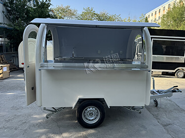 White Mobile Food Cart equipped with AL KO type chassis