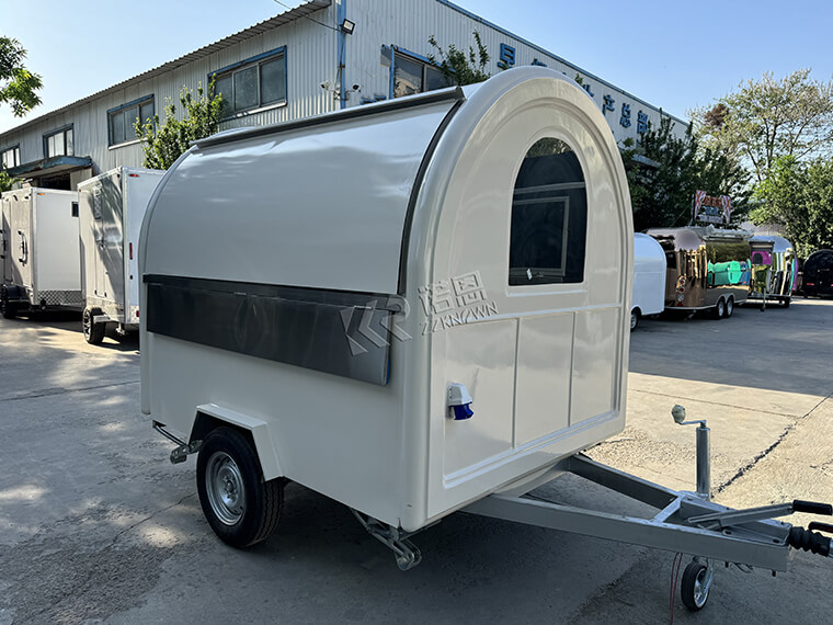 White Mobile Food Cart equipped with AL KO type chassis