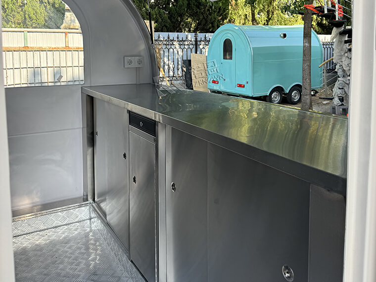 White Mobile Food Cart equipped with AL KO type chassis